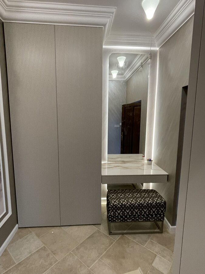 Coat rack with milled painted MDF doors according to RAL